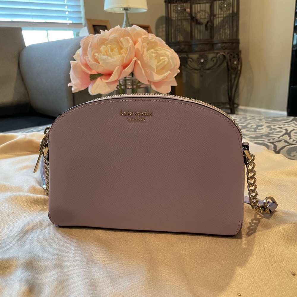 Kate Spade ‘Spencer’ purple leather bag.